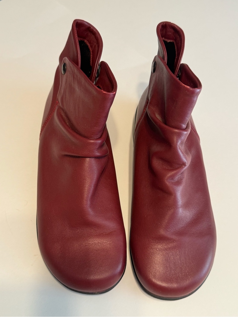 Arcopedico Wine Red Leather Gathered Slouch Ankle Booties. Water-resistant